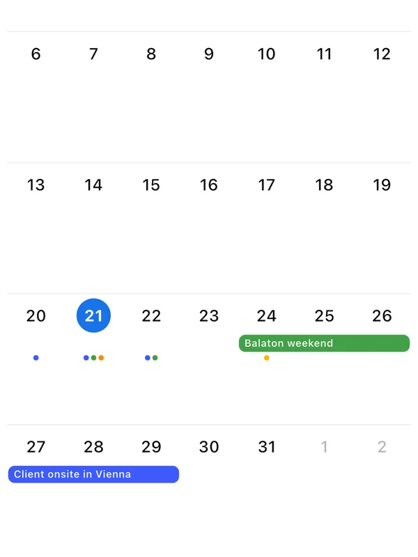 Amber month calendar with deadline dots and multi-day project bars